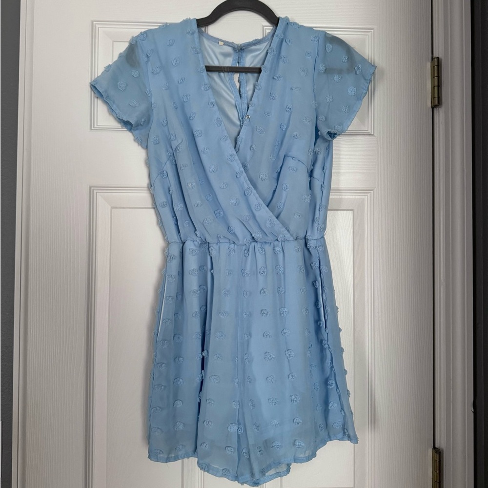 Blue romper with pockets